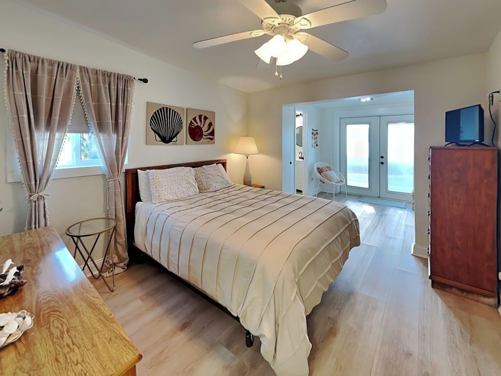 Bathing Suit Beach Bungalow by Distinctive Beach Rentals