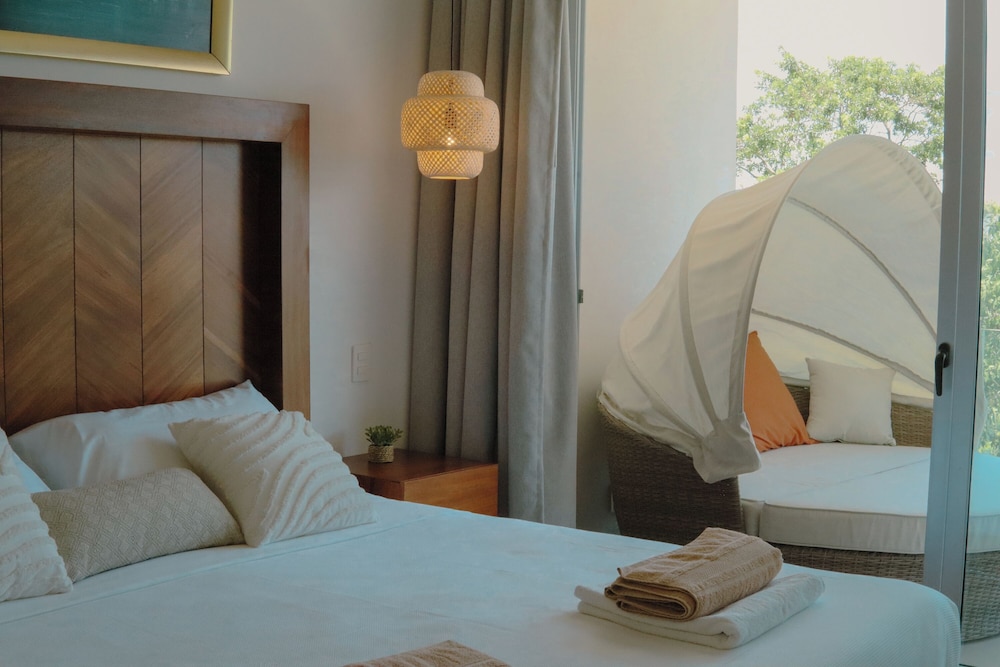Stylish Playacar Condos w Balcony & Pool