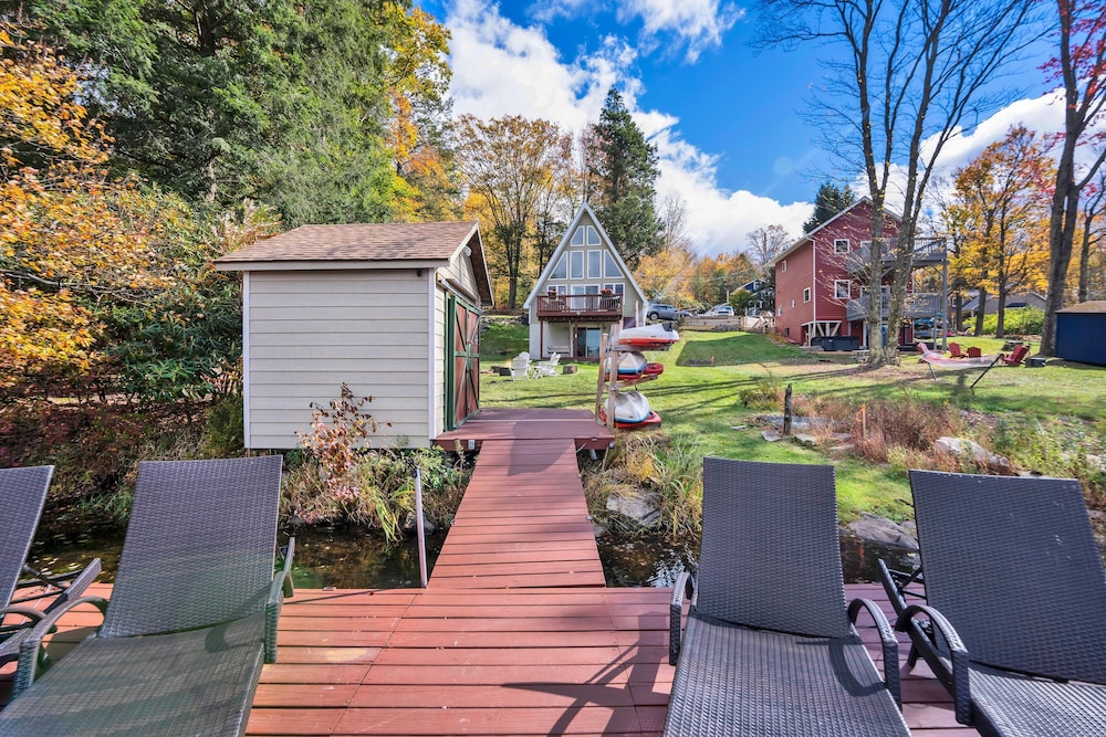 Lakefront A-frame Dock Kayaks Fire Place