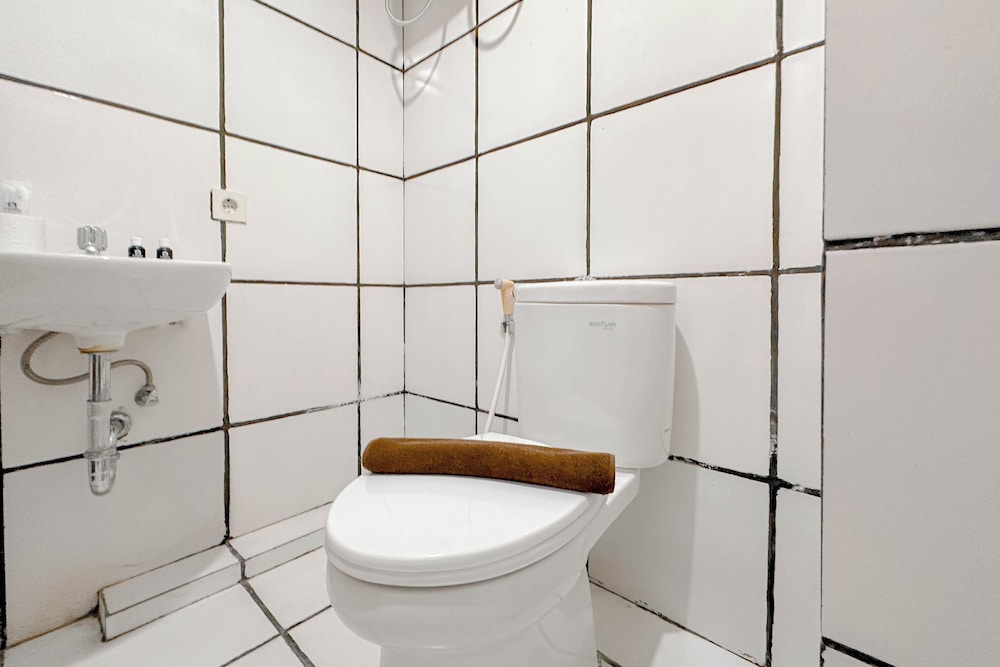 Combined Grey Toned 2Br Apartment At The City Square Surabaya