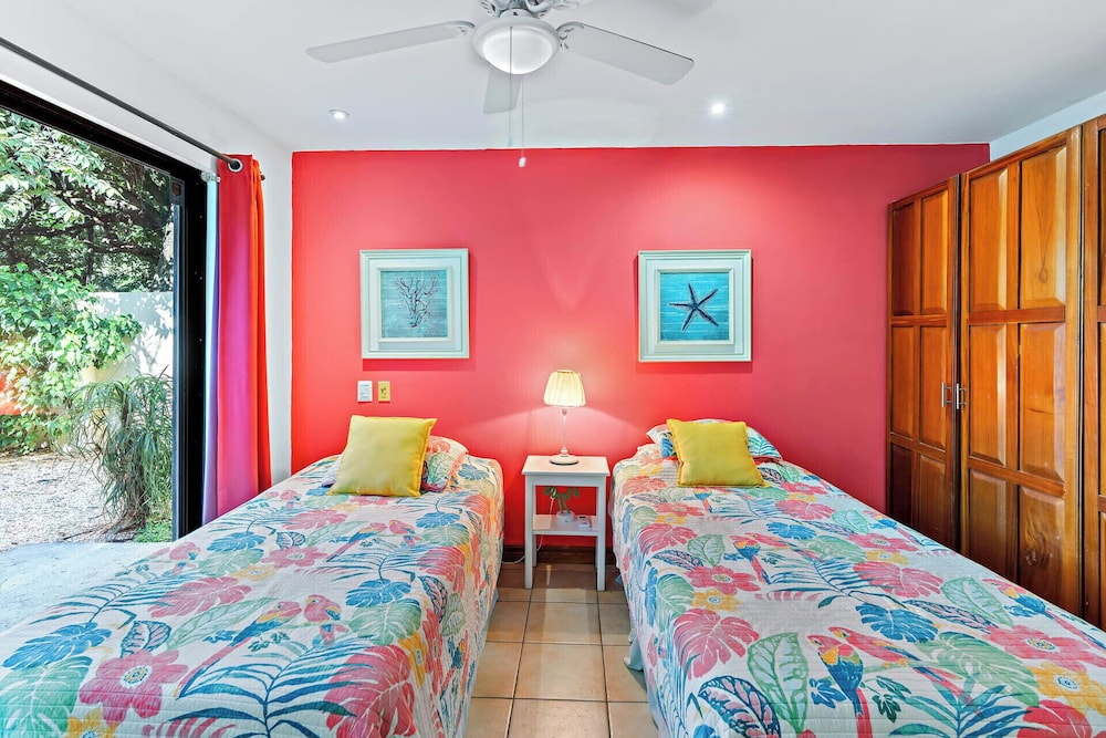 Inviting Home with Colorful Decor and Private Backyard Oasis with a Swimming Pool & Shaded Terrace