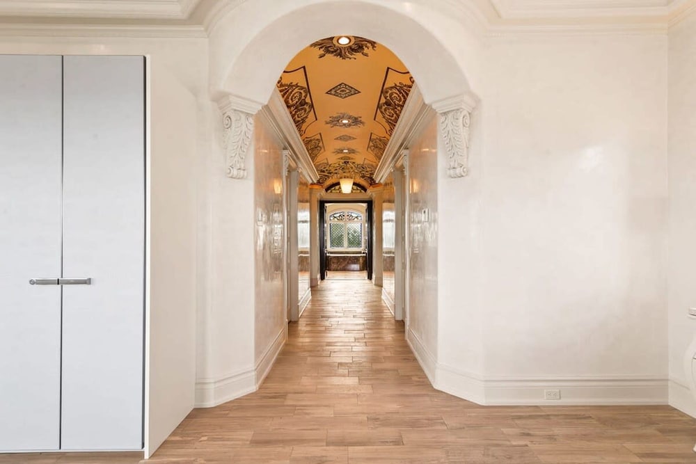 Luxurious 3-story Estate With Gym Pool Slide Private Beach and Lighthouse Views