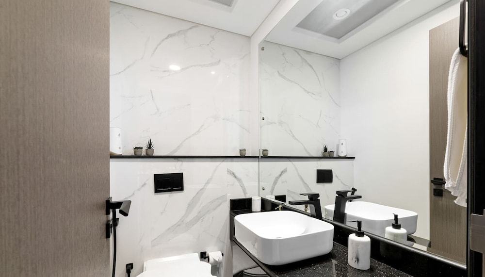 Stylish 1BR Apt w Pool in JVC nr Dubai Sports City