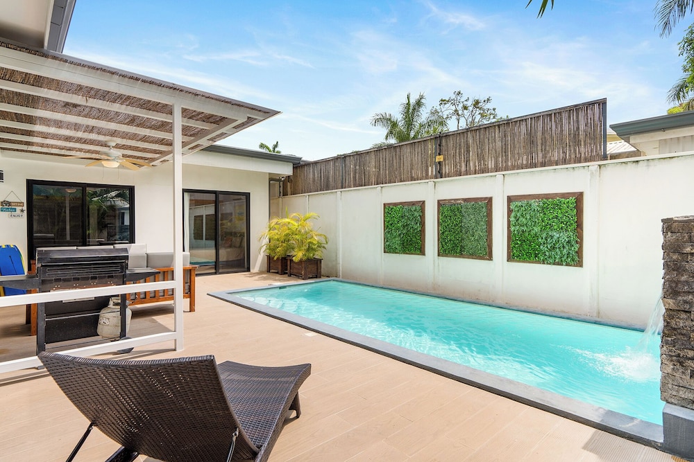 Stylish Modern Home with a Tranquil Outdoor Oasis, Spacious Open Floor Plan, and Private Swimming Pool