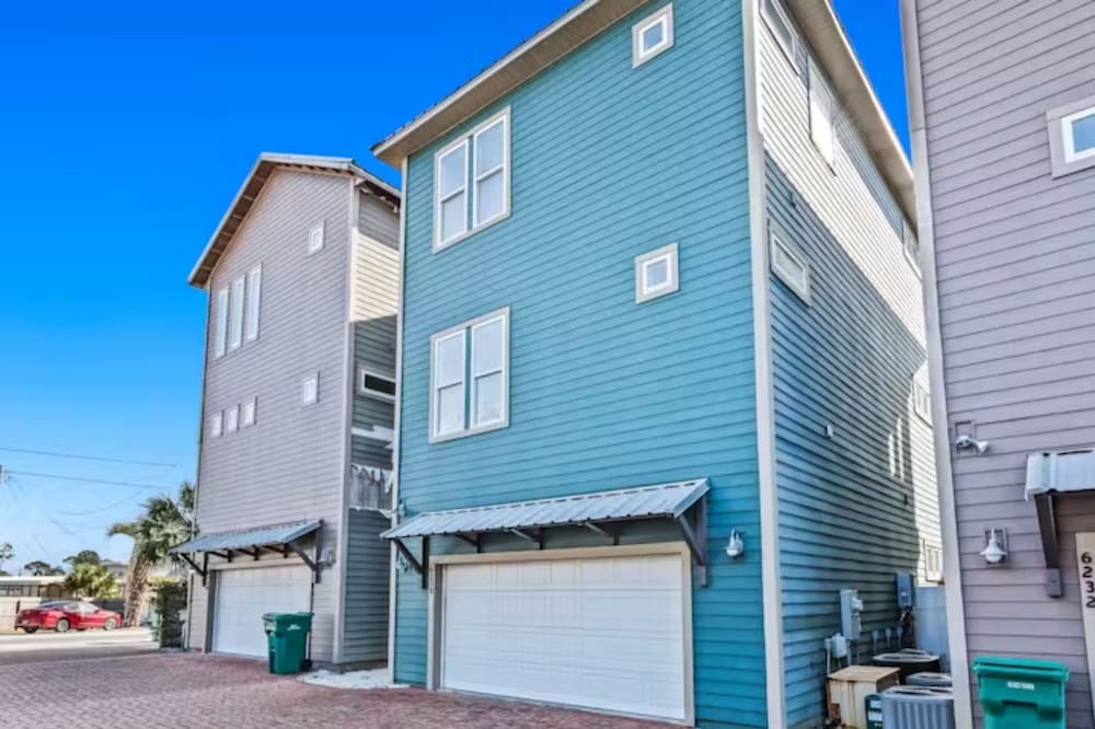 Serenity by the Sea! 4BR Retreat, Sleeps 12, Walk to Beach & Community Pool