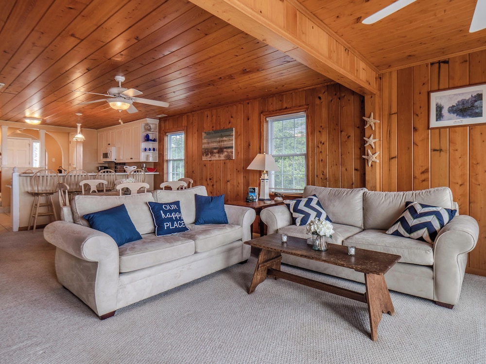 A Charm of Finches by Topsail Realty