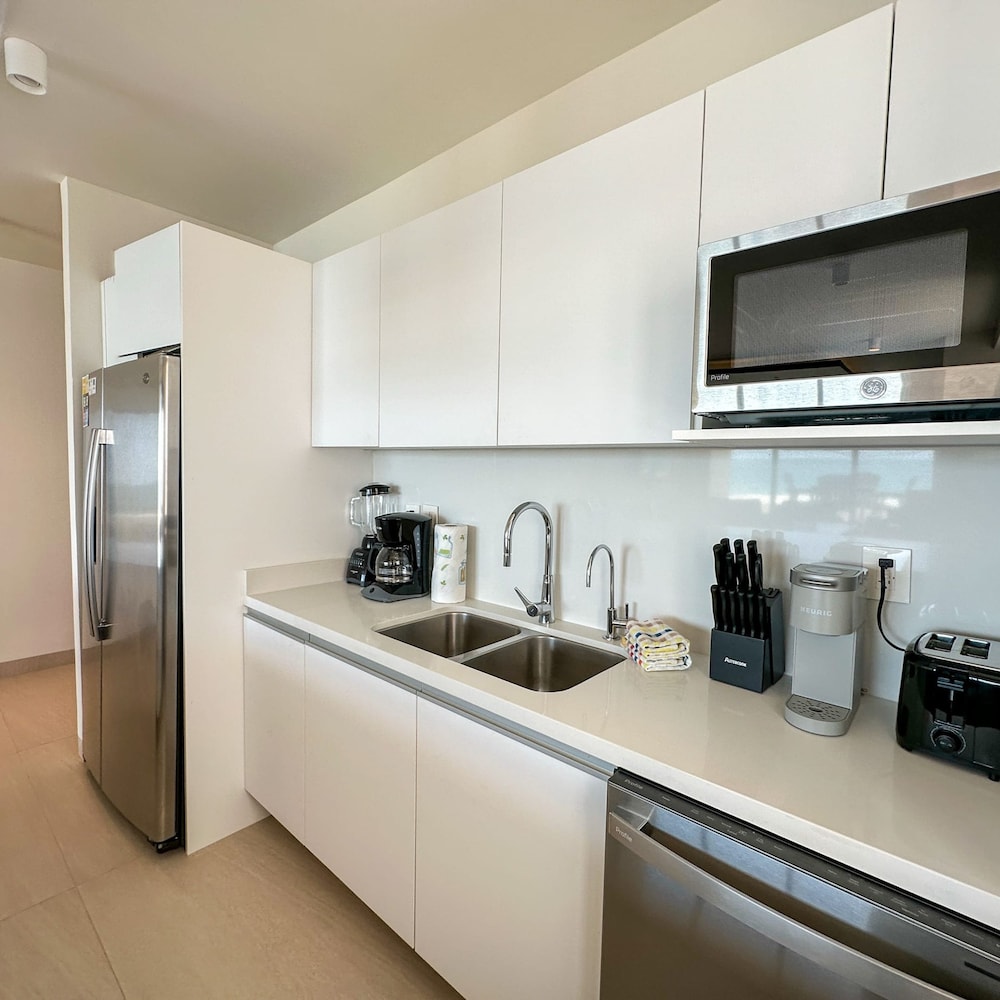 Brand-new Modern 2BR Gem on Iconic Sandy Beach