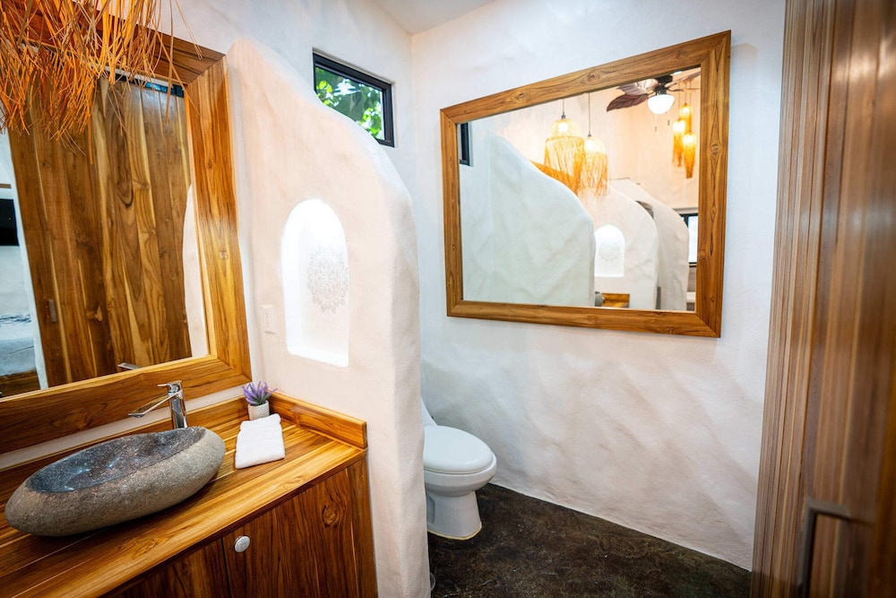 Bohemian Tropical Villa with a Tiki-Style Swimming Pool & Swim-Up Bar with an Attached Studio Apartment