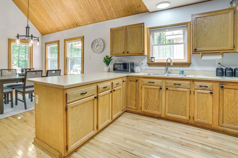 Dock Access + Nearby Beach: Higgins Lake Retreat!