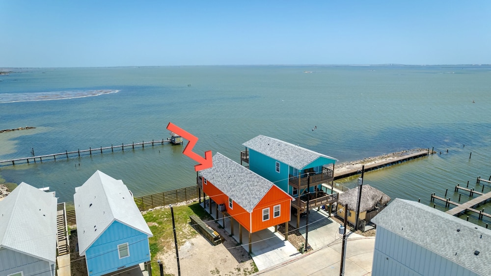 Waterfront Escape w/ Views Shared Pool & Boat Dock Orange Crush by Avantstay