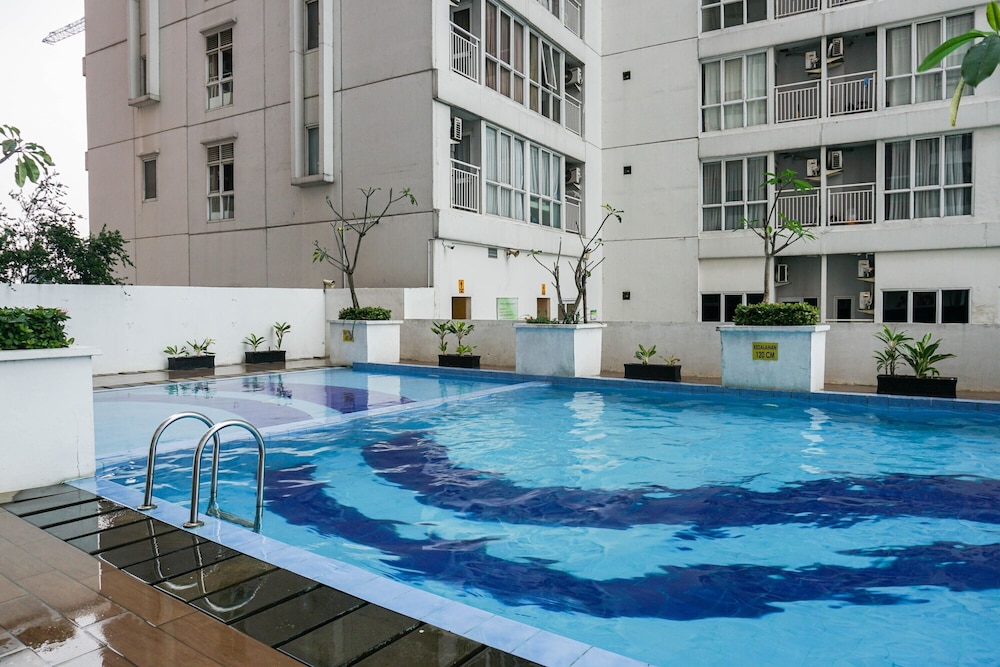 Cozy Minimalist Studio @ Taman Melati Margonda Apartment By Travelio view 5