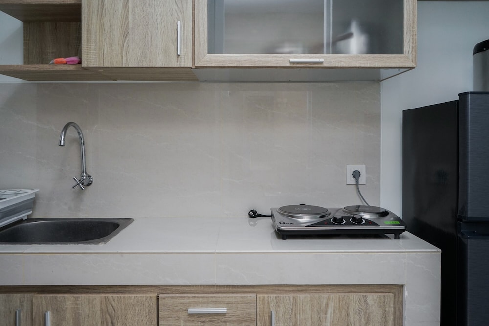 Cozy and Nice Studio Apartment at Springwood Residence