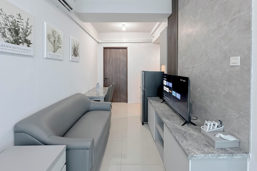 Combined Grey Toned 2Br Apartment At The City Square Surabaya