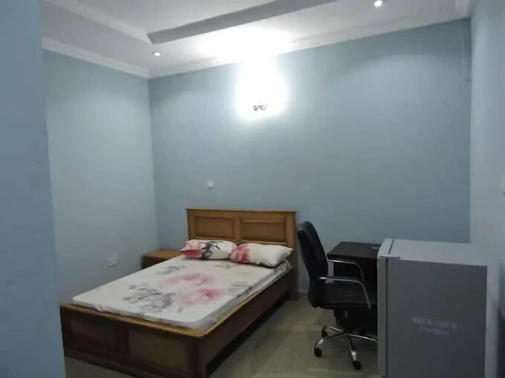 Wig and Gown Apartment