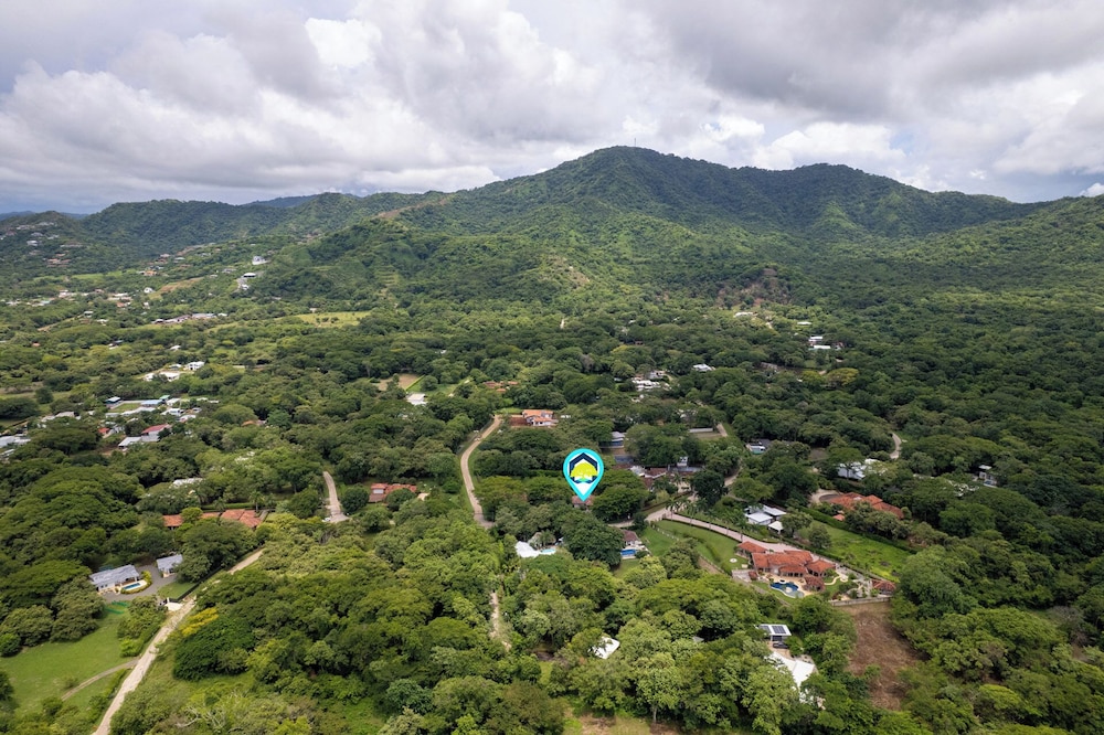 Beautiful home in a gated Neighborhood, Walking Distance to Beach with Garden
