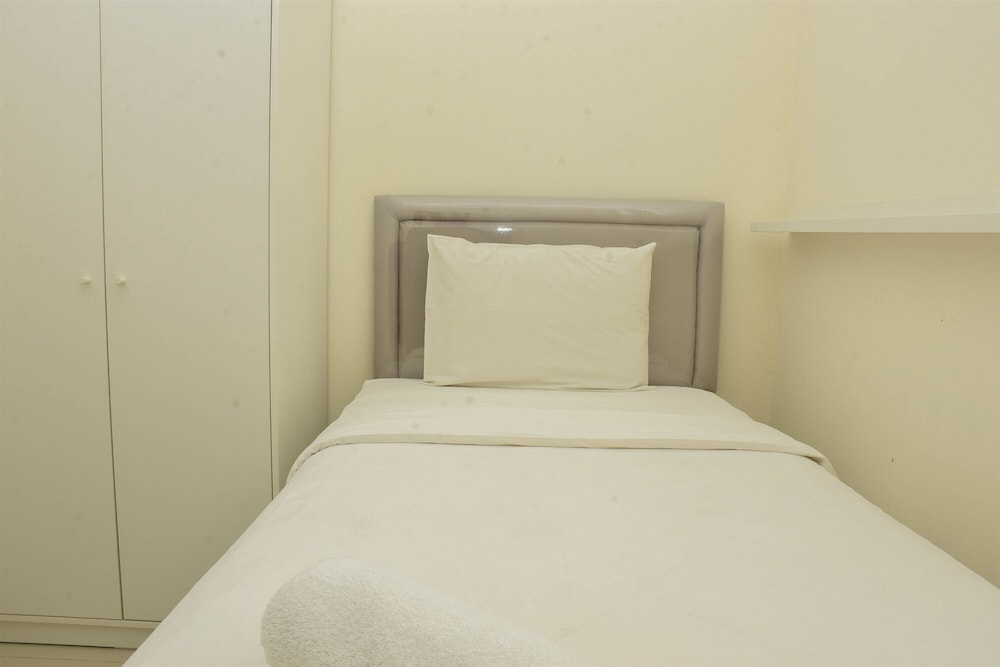 Fancy And Nice 2Br At Green Pramuka City Apartment view 4