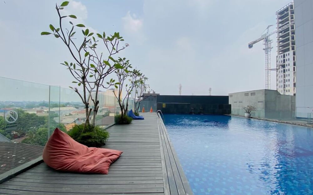 Wooden Nest 2Br Without Living Room At Evenciio Margonda Apartment