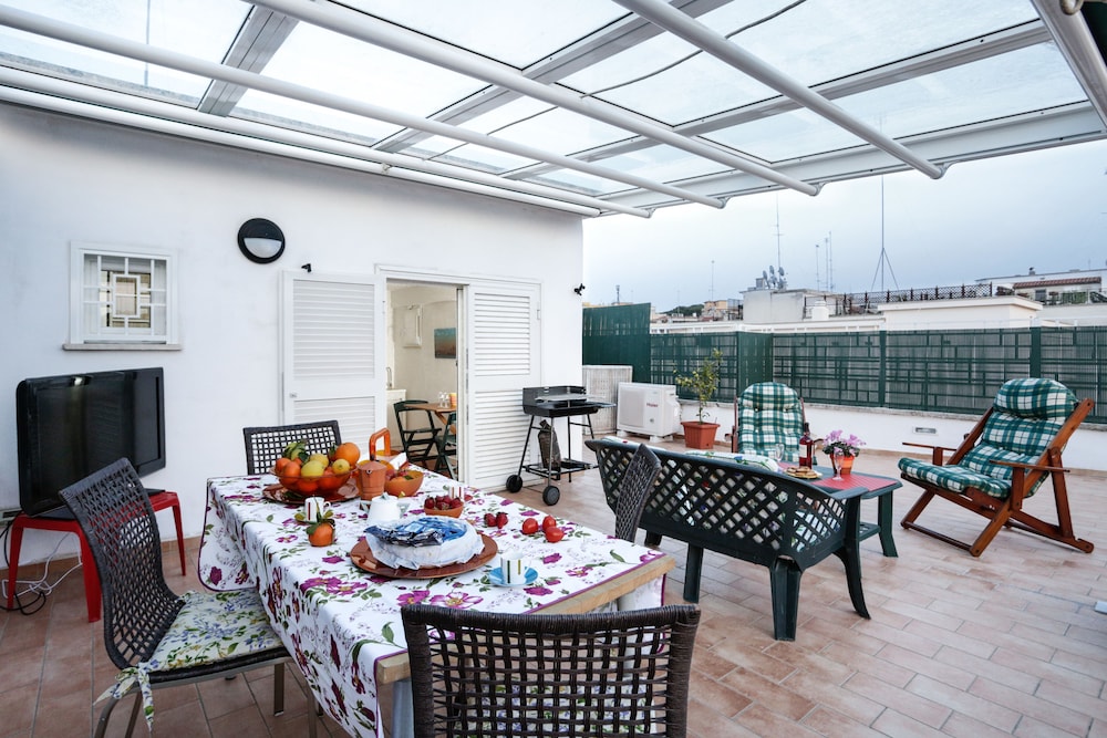 Enjoy the Sunset on Your Vatican Terrace