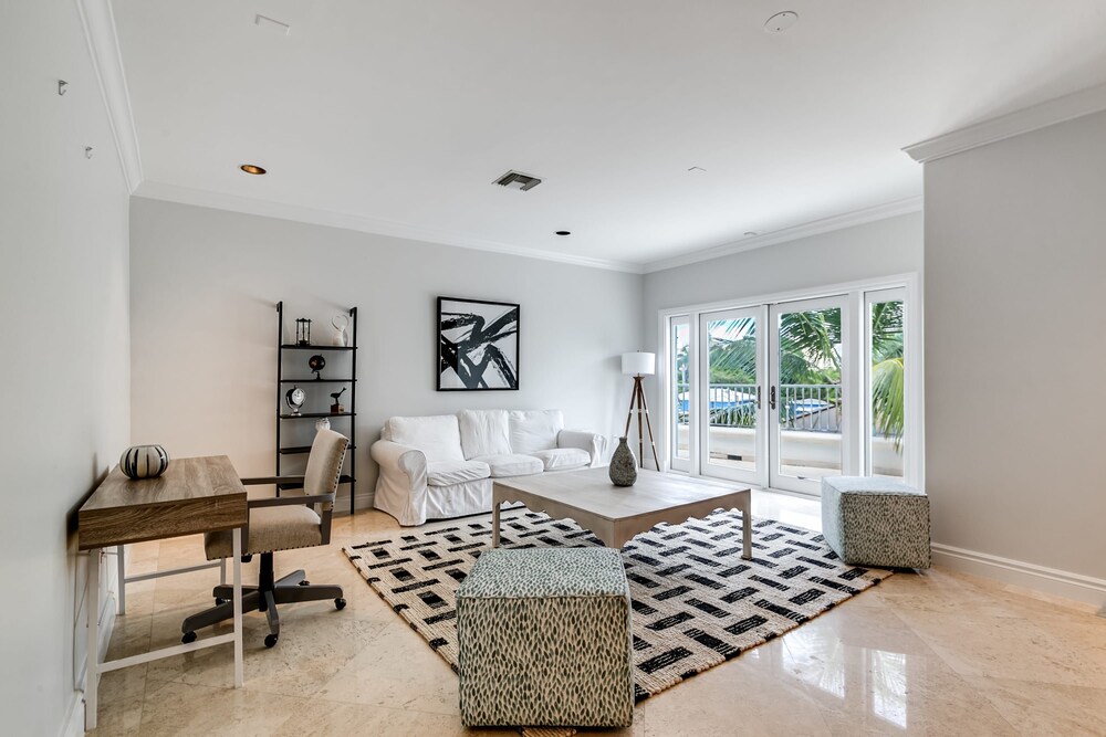 Waterfront Mansion With Game Room Gym Media Room and Guest House