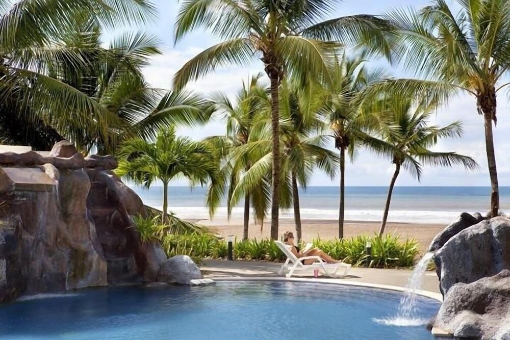 Elegant Beachfront Condo at Diamonte del Sol - 801s by RedAwning