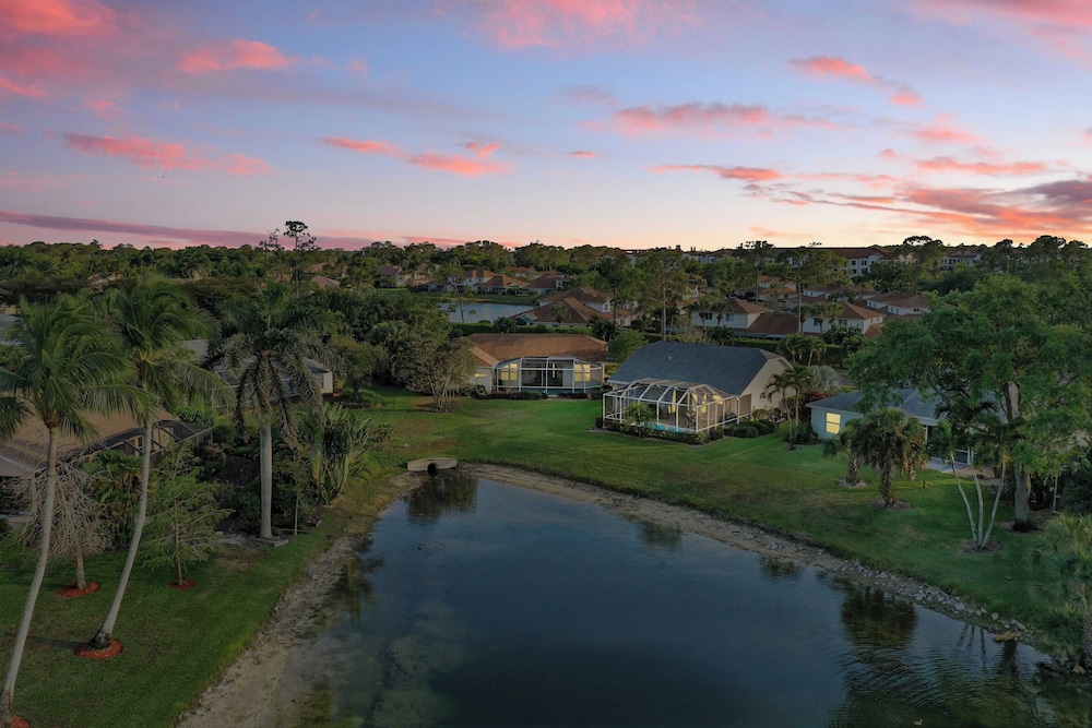 Private Pool, Pond Views, & Bonus Lounge in Gated Naples Community Drive to Dining & Sand