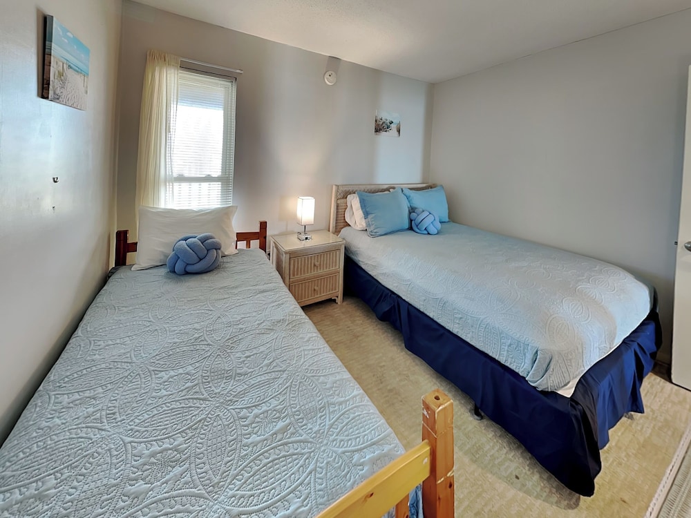 A Wave From It All by Topsail Realty