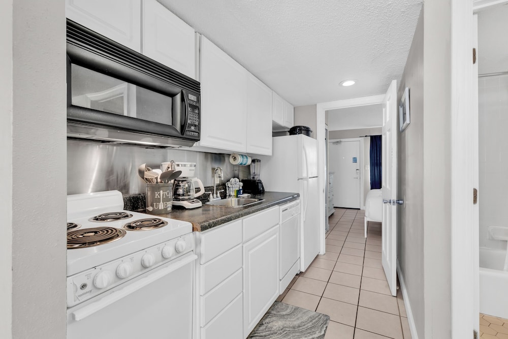 Beachfront Haven 1BR Condo with Balcony