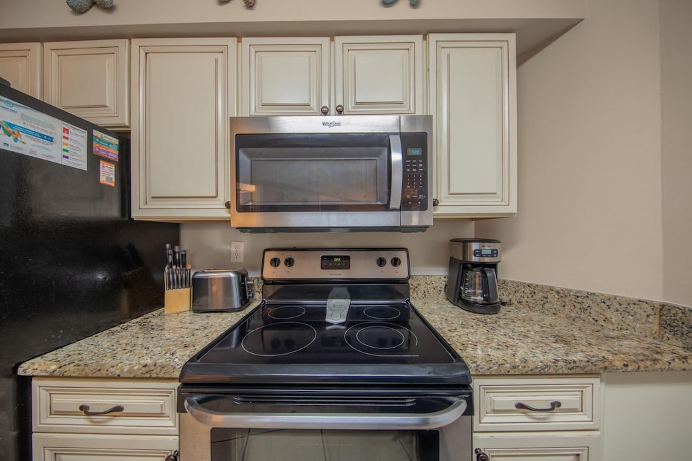 Charming Condo on Beach Indoor Outdoor Pool view 4