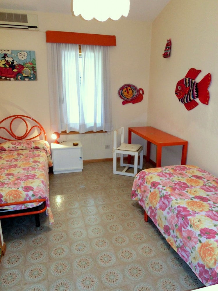 Lignano Riviera con 3 camere e giardino