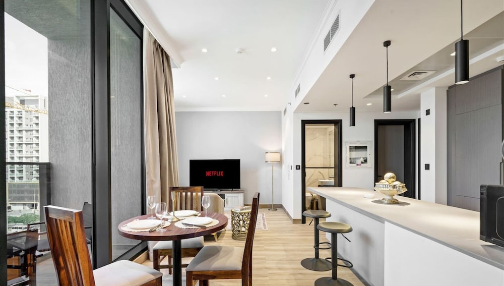 Stylish 1BR Apt w Pool in JVC nr Dubai Sports City