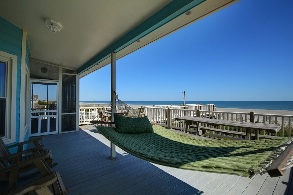 Windchimes 4 Bedroom Home by RedAwning