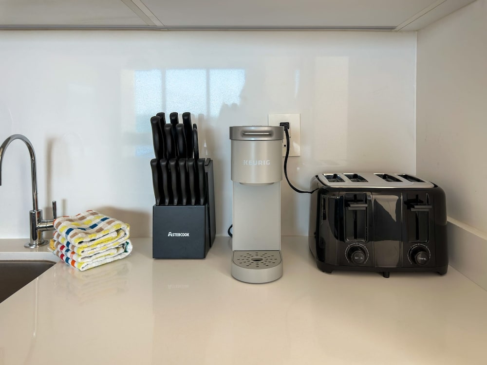 Brand-new Modern 2BR Gem on Iconic Sandy Beach
