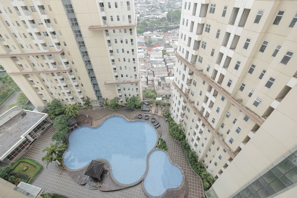 Minimalist and Well Designed 2BR Apartment with Extra Room at Vittoria Residence