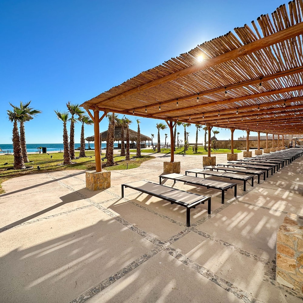 Brand-new Modern 2BR Gem on Iconic Sandy Beach