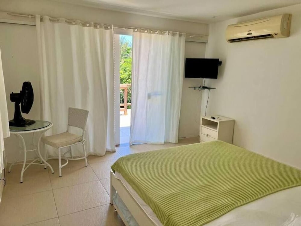 Jolly Praia de Tucuns e Hospedagem