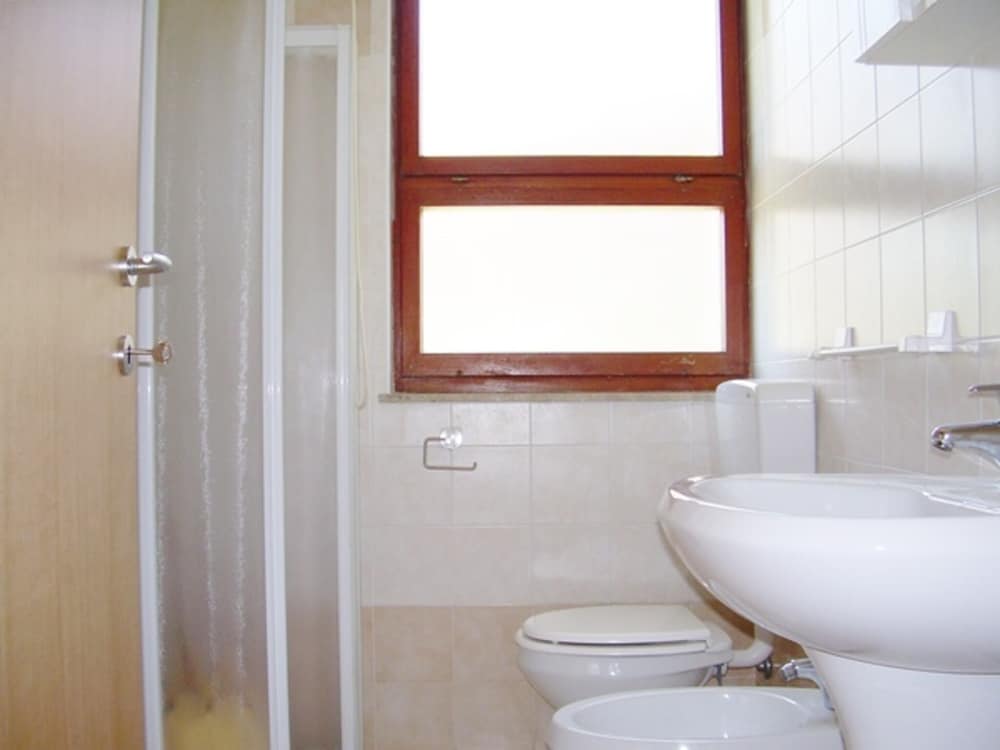 Three-room Apartment in a Family House With Shared Garden in Lignano Pineta
