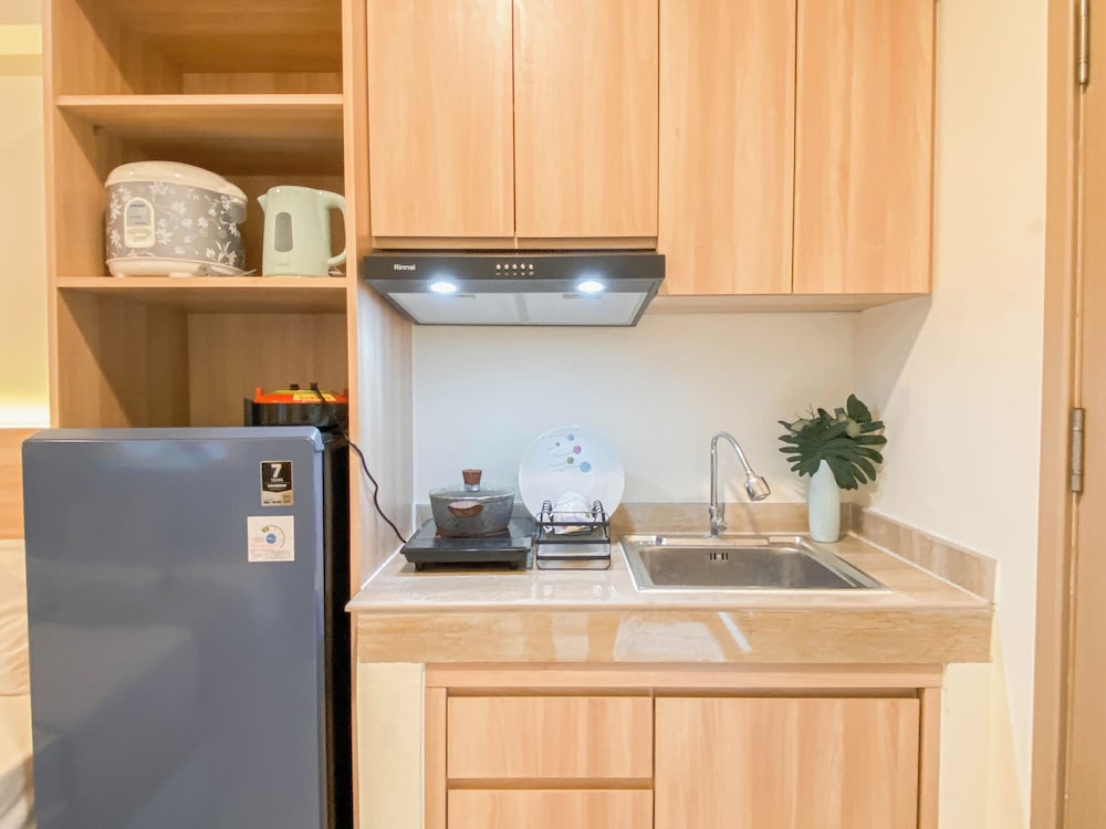 Warm Minimalist Studio Apartment Near Paramadina University At Meikarta