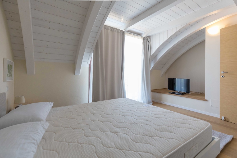 Tasso Apartments en Comacchio — hotel room