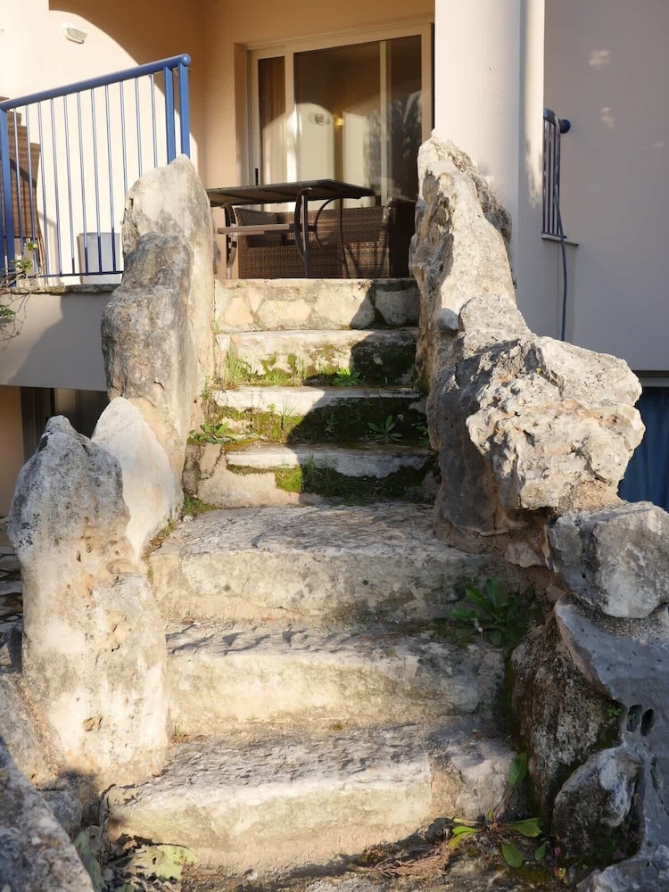 Cassiopeia 1BR Apt on Beach with Pool