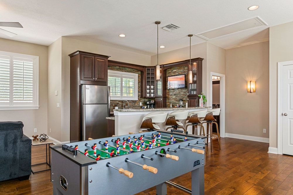 Waterfront Pool Pickleball Court Game Room