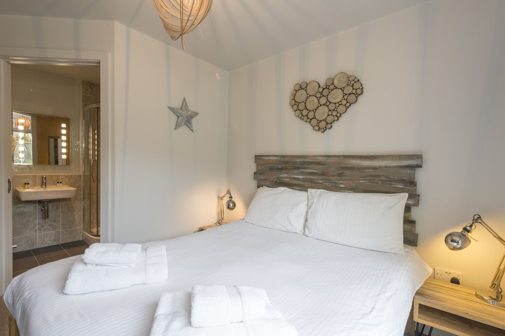 The Beach House & Porth Sands Apartments
