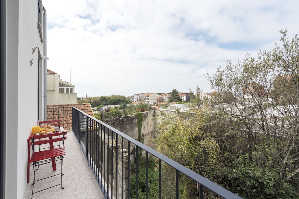 Downtown Bright Balcony Apartment by Vacationy