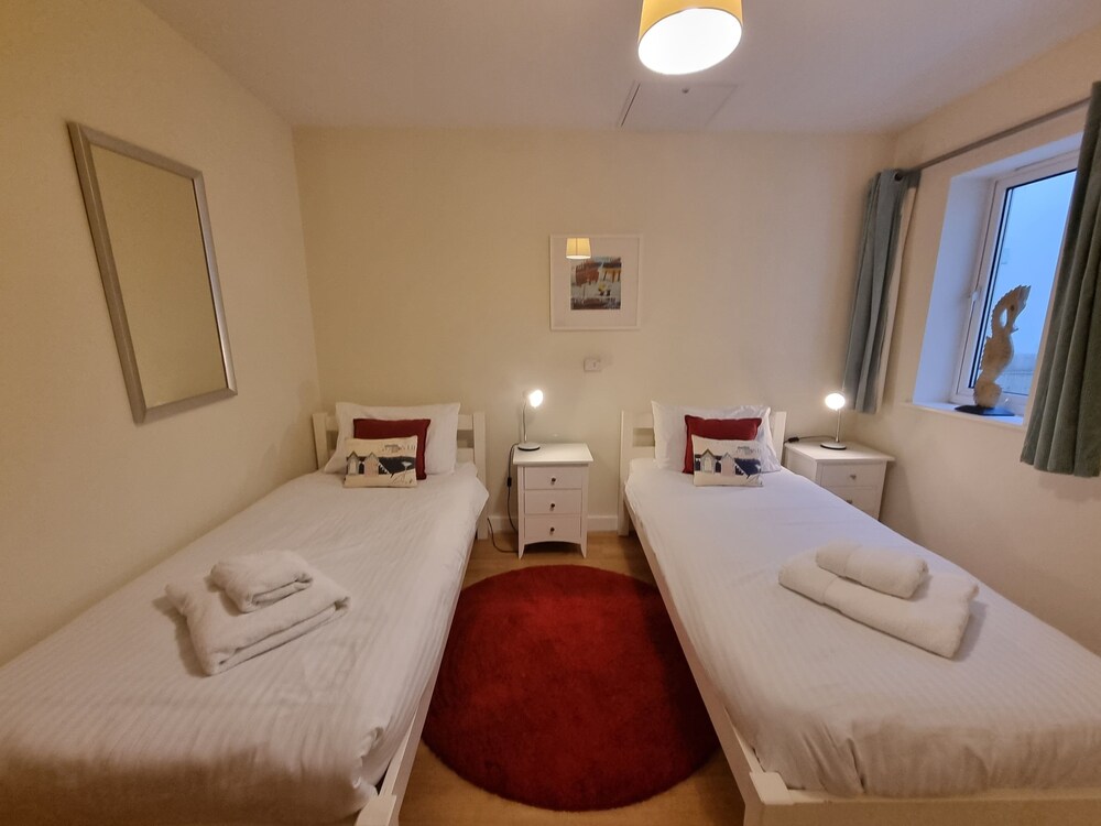 The Beach House & Porth Sands Apartments