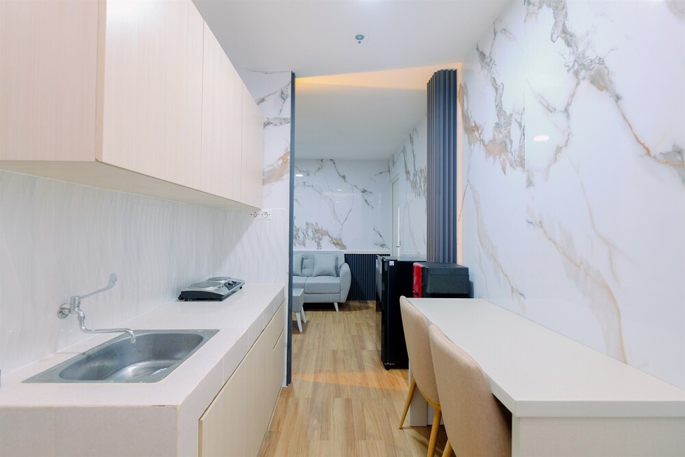 Restful and Modern 2BR at Sentul Tower Apartment