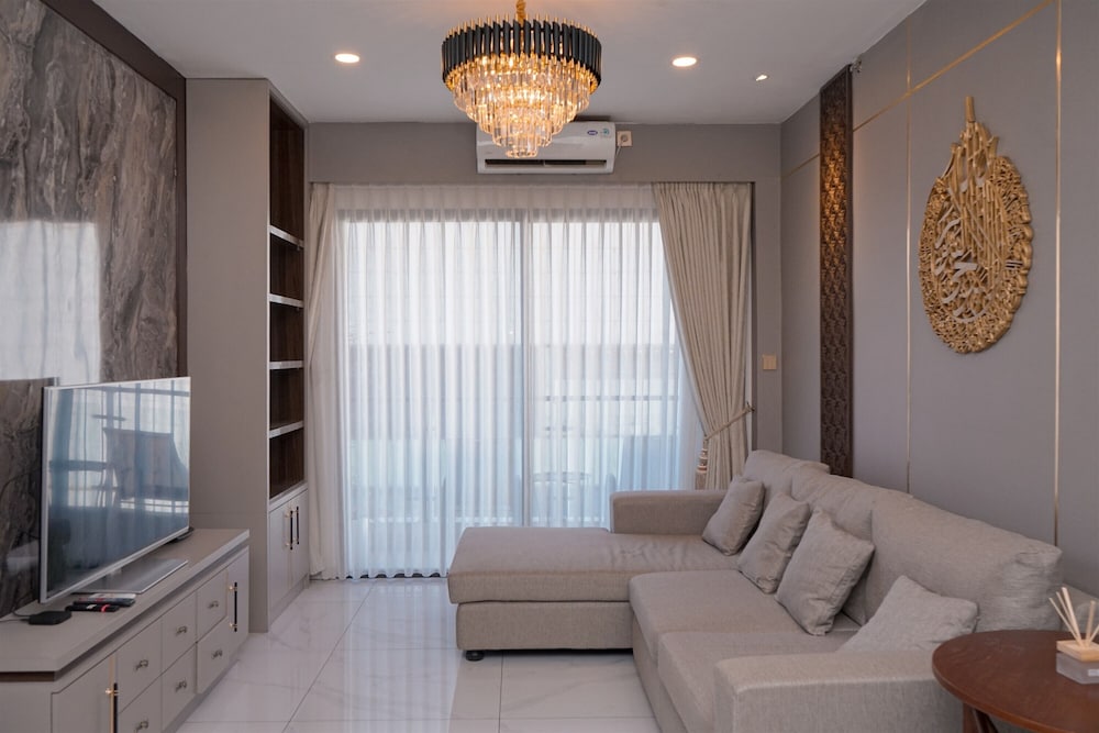Warm Living 3BR at Sky House BSD Apartment