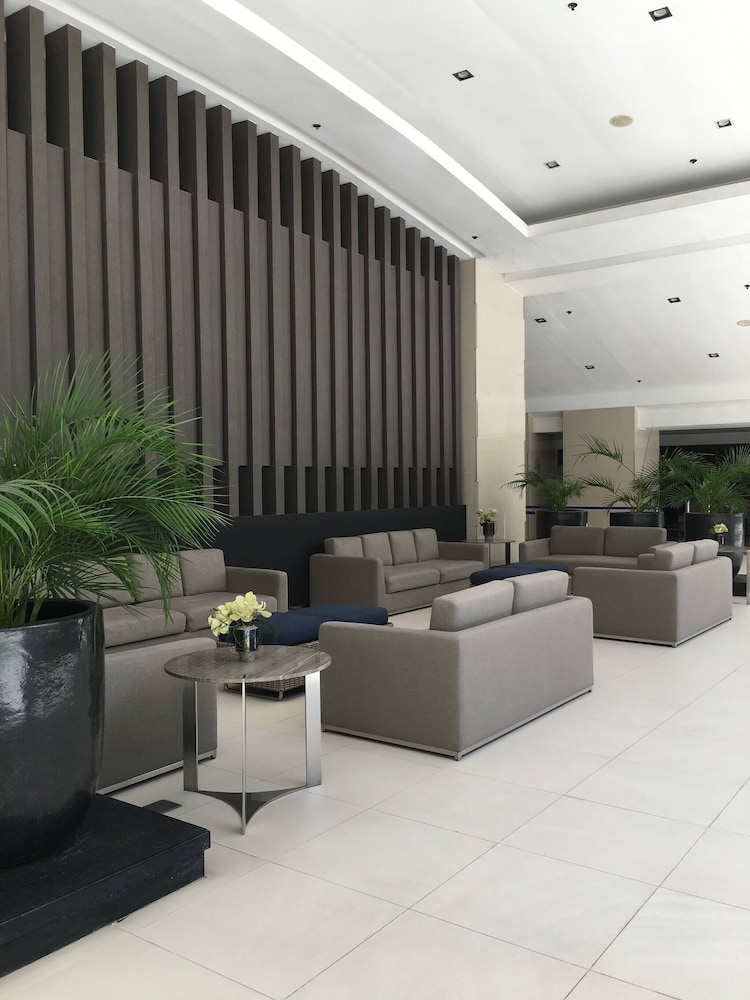 Relax in Pasay City's Best Kept Secret - Spacious Condo With Garden View