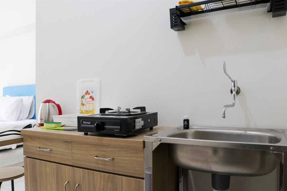 Warm and Nice Studio at Podomoro Golf View Apartment