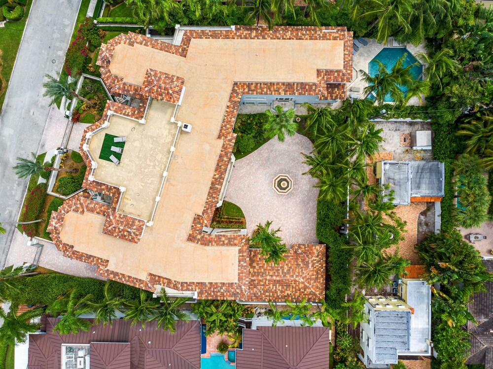 Waterfront Mansion With Game Room Gym Media Room and Guest House