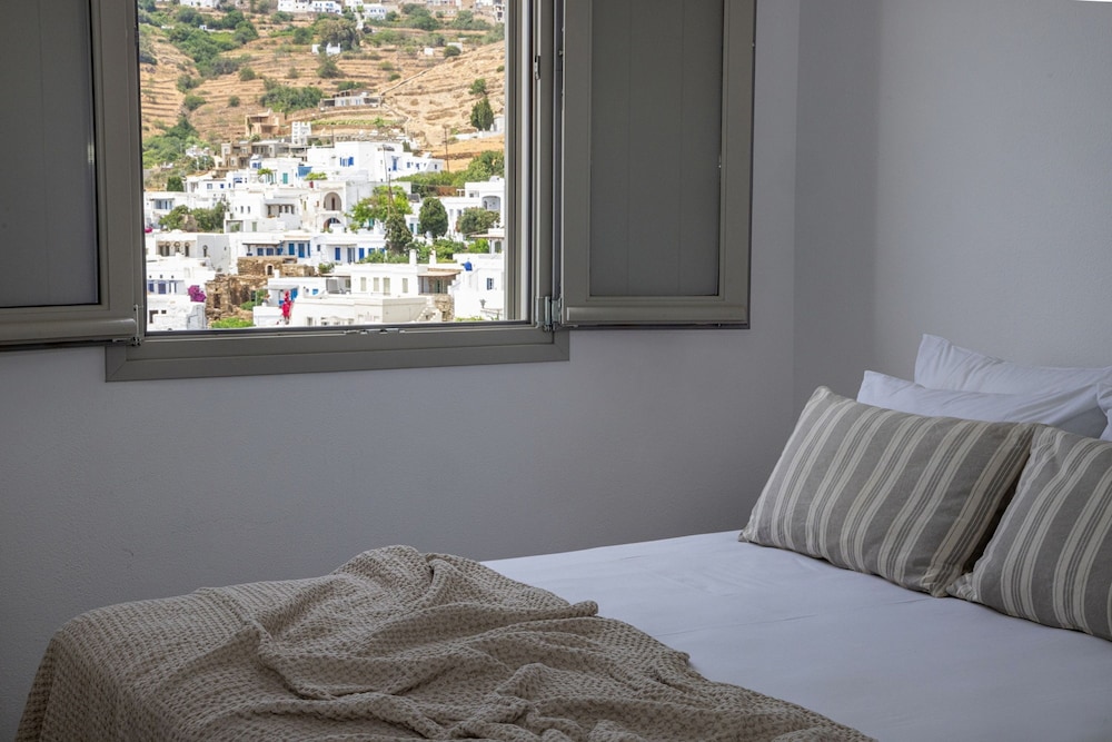 By The Stone Tinos