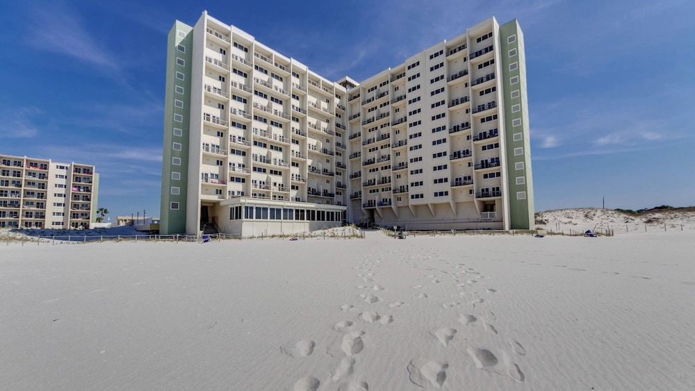 Beachfront Charm Meets Lake Life + Free Tickets: Dolphin Cruise & More!
